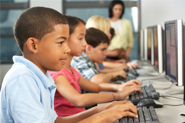 elementary students in computer lab