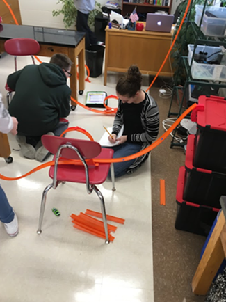 Students experiment with cars